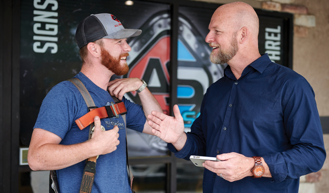 hope_wateredgardens14b Photo of James Whitford talking with volunteer worker at Watered Gardens