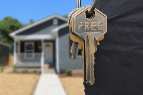 Closeup of housekey with the word 'FREE' on it