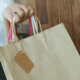 Closeup photo of woman holding shopping bag