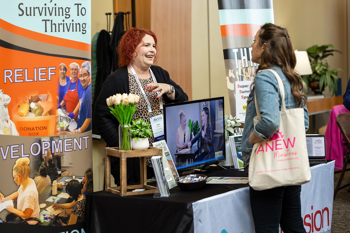 booth at True Charity Summit conference exhibition
