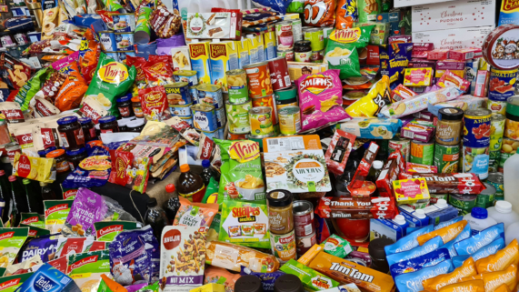 Photo of a large pile of grocery food items