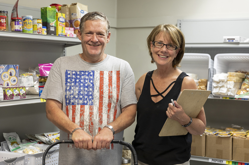 Photo of mission market at Watered Gardens Photo of man and woman at a True Charity aligned gospel rescue mission