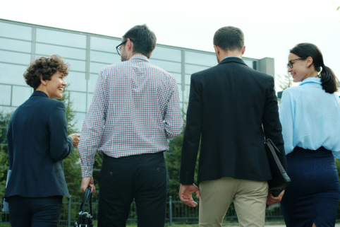 Photo of business people walking together