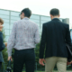 Photo of business people walking together