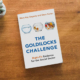 Photo of book, The Goldilocks Challenge, sitting on wood tabletop